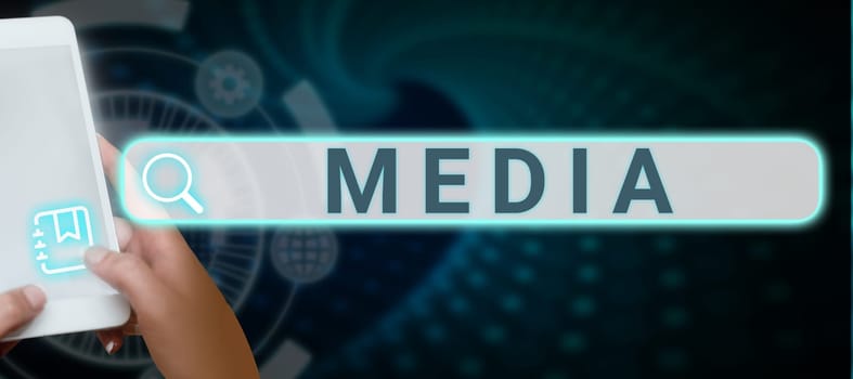 Hand writing sign Media, Business approach the main means of mass communication that are regarded collectively