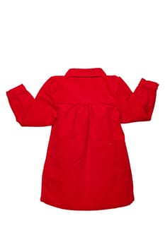 Summer dress isolated. A beautiful red girl's dress with attached heart shaped pockets and long sleeves isolated on white. Kids spring and autumn fashion. Back view.