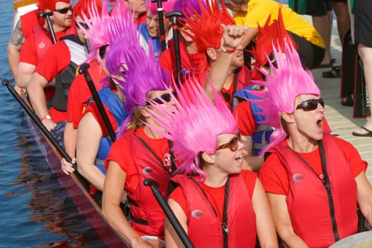 Dragon boat races on Lake Champlain in Burlington, Vermont, USA.  The races are held to raise money for breast cancer survivors.