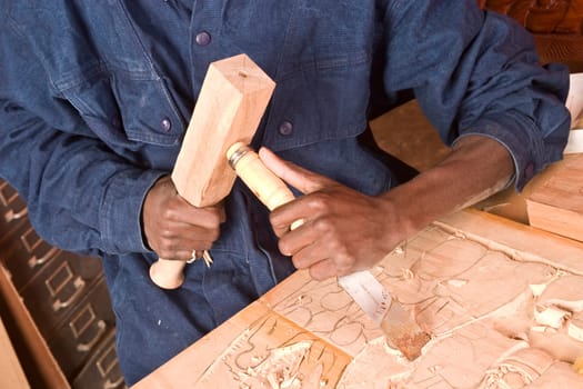 Issa is a refuge and works as a wood carver in Burlington, Vermont.