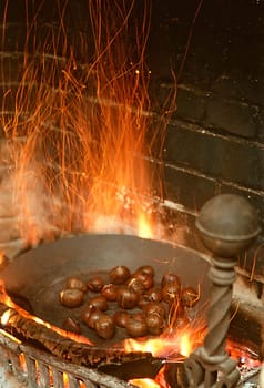 Roasting chestnuts on an open fire at the Weathersfield Country Inn in Weathersfield, VT.