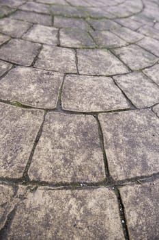 Detail of urban walkway floor decorated with cement