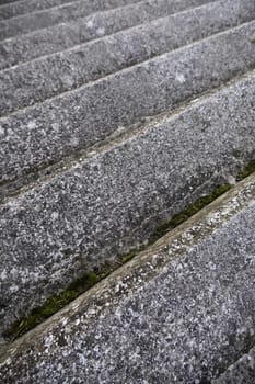 Detail of an old staircase in the city, ruin and destruction by the passage of time