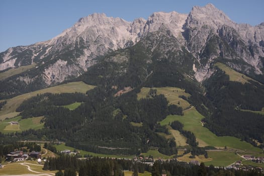 Beautiful scenic view of the Mountains with a cloudy sky near Leogang in Austria