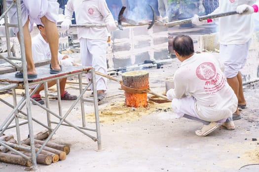 Nonthaburi, Thailand - AUG 17, 2019 - Pouring ceremony for Thonglor Buddha statues at Samian Nari Temple at Chatuchak, Bangkok, Thailand.