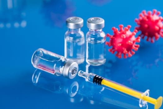 Close up medical syringe with a vaccine