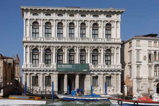 Venice, Italy - September 6, 2022: The white marble facade of Ca' Rezzonico on the Grand Canal in Venice. Italy