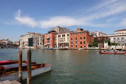 Venice, Italy - September 5, 2022: Wooden mooring pole at Canal Grande in Venice. Italy