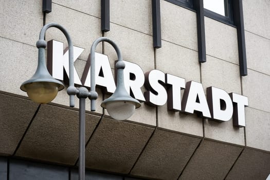 Lettering and neon sign of the department store group Karstadt at a branch in Goslar in Germany