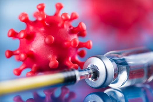 Close up medical syringe with a vaccine