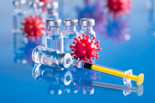 Close up medical syringe with a vaccine