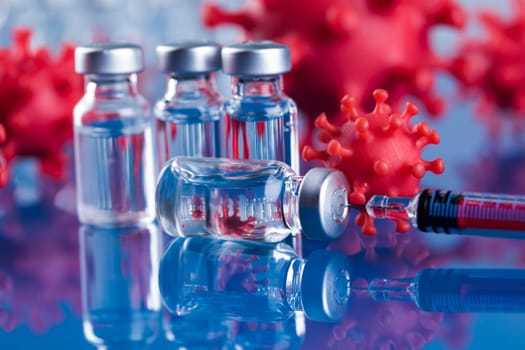 Close up medical syringe with a vaccine