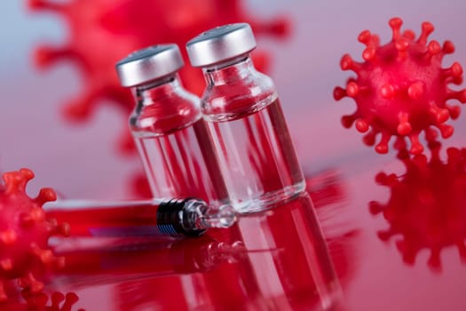 Close up medical syringe with a vaccine