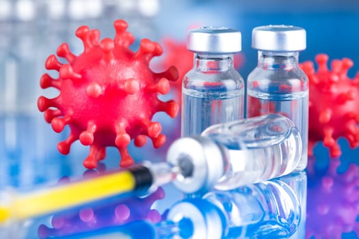 Close up medical syringe with a vaccine