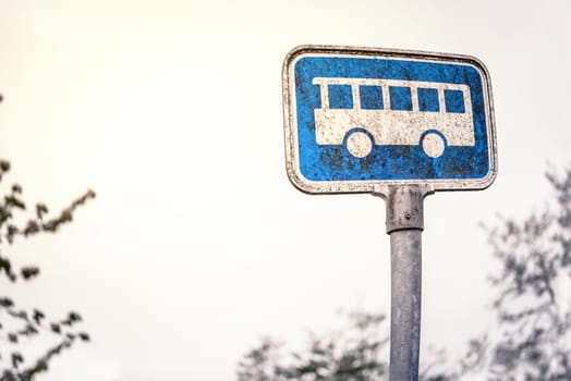 Retro bus stop sign in blue color