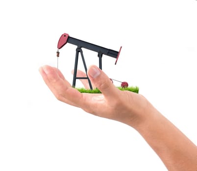 hand hold pumpjack isolated on white background