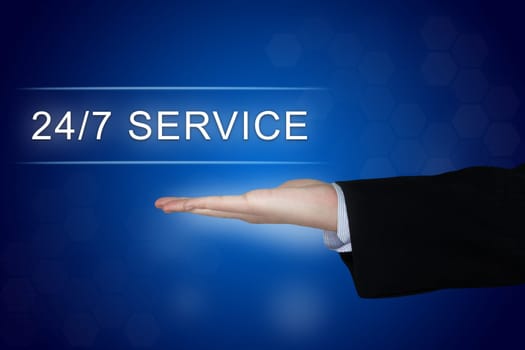 24 hours a day, 7 days a week service button with business hand on blue background