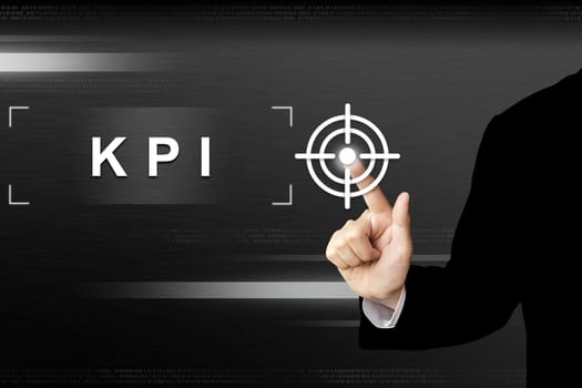business hand clicking key performance indicator or KPI button on a touch screen interface