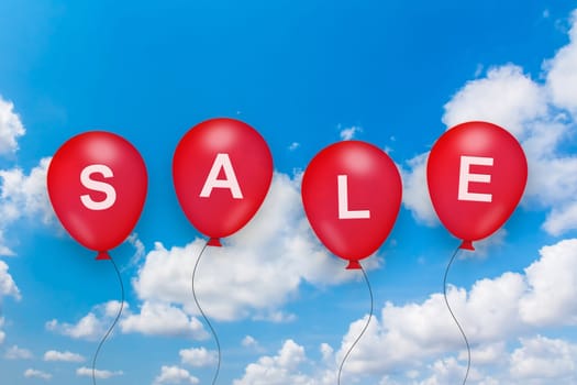sale text on balloon with blue sky background