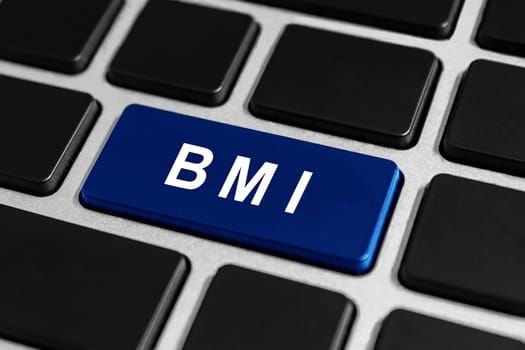 BMI or Body Mass Index blue button on keyboard, healthcare concept