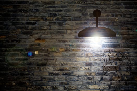 Old interior room with brick wall and three light spots for adv or others purpose use