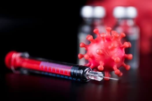 Close up medical syringe with a vaccine
