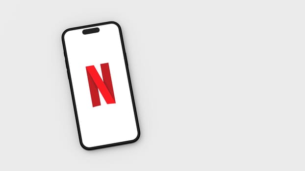 Netflix Logo on Mobile Phone Screen on Flat Light Gray Background with Copy Space 3D Render Illustration, Top View