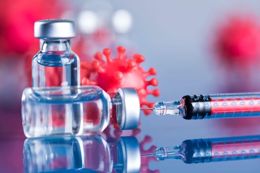 Close up medical syringe with a vaccine