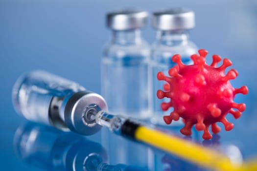 Close up medical syringe with a vaccine