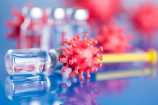 Close up medical syringe with a vaccine