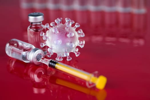 Close up medical syringe with a vaccine