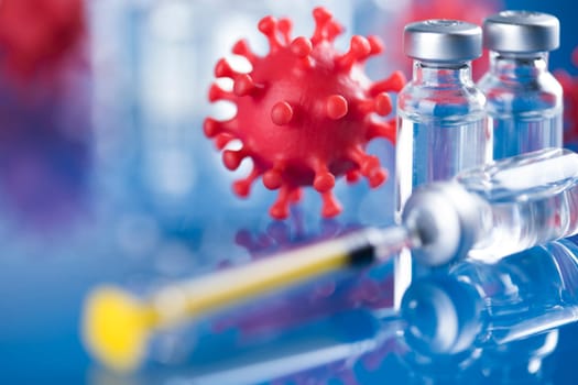 Close up medical syringe with a vaccine