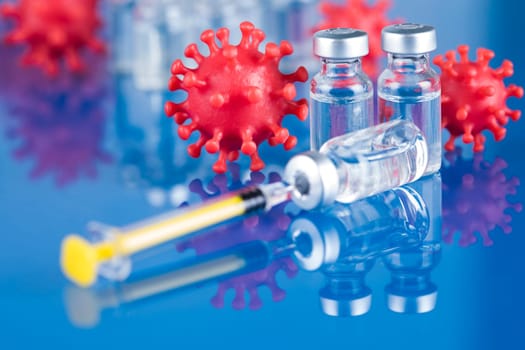 Close up medical syringe with a vaccine