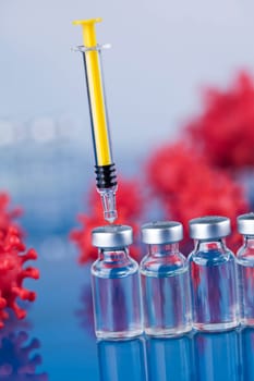 Close up medical syringe with a vaccine