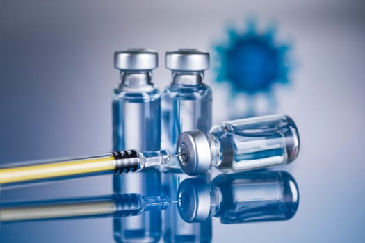Close up medical syringe with a vaccine