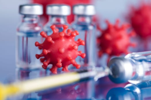 Close up medical syringe with a vaccine