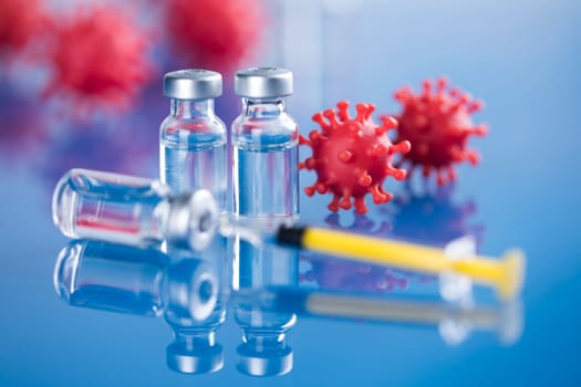 Close up medical syringe with a vaccine