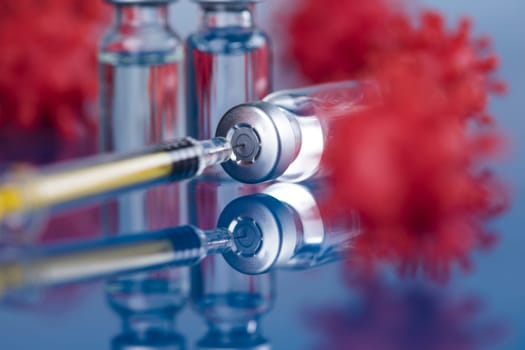 Close up medical syringe with a vaccine