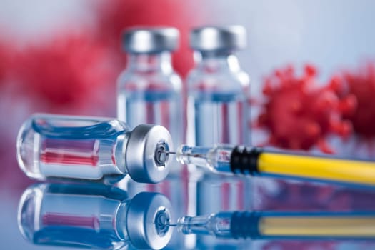 Close up medical syringe with a vaccine