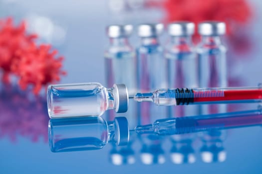 Close up medical syringe with a vaccine