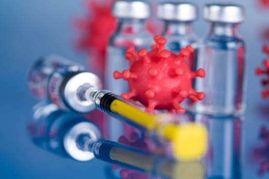 Close up medical syringe with a vaccine