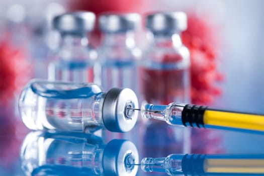 Close up medical syringe with a vaccine