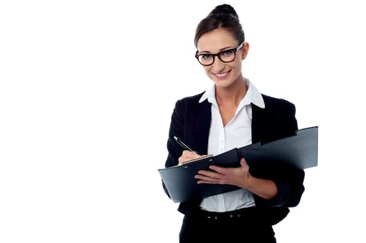 Happy female executive signing the new contract