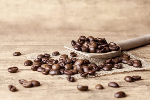 Spoon with coffee beans
