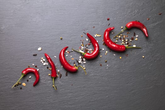 chalk board background with red chili peppers