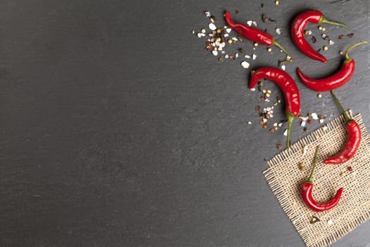 chalk board background with red chili peppers