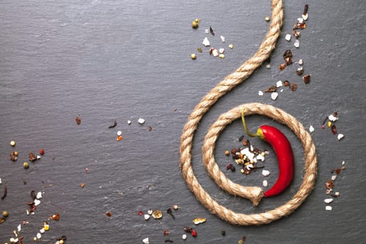 red chili pepper with a rope