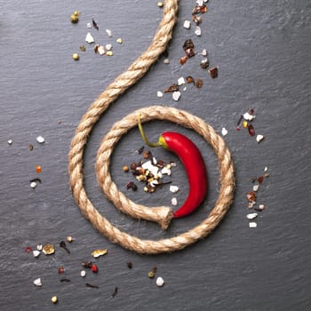 red chili pepper with a rope