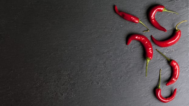 chalk board background with red chili peppers