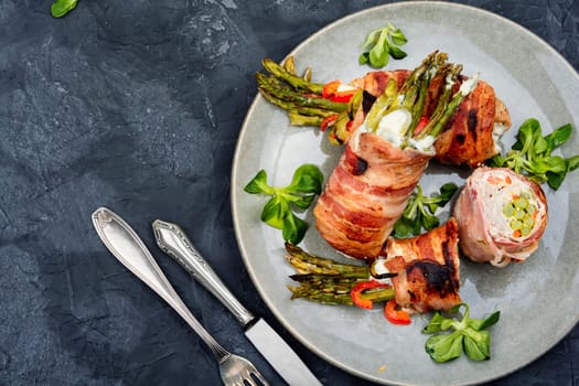 Meatloaf ,veal roll filled with asparagus and cream cheese. Copy space